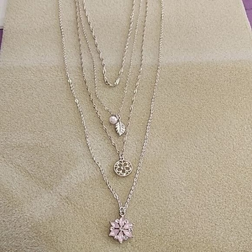 Claire's silvertone multi-strand necklace with‎ pink flower pendant